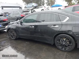 2018 Nissan Altima 2.5 SL with VIN 1N4AL3AP4JC288183, listed as a IAAI auction lot 41466582 with 100,858 mi miles. Bid and sale history available at carsss.com. Image 14.