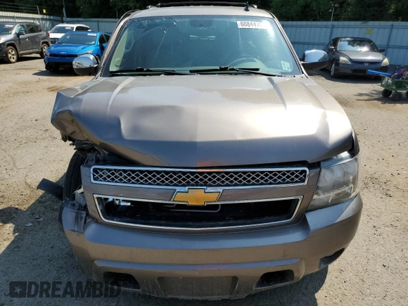 2013 Chevrolet Suburban LT with VIN 1GNSCJE07DR104489, listed as a Copart auction lot 60844784 with 185,420 mi miles and Salvage Title. Bid and sale history available at carsss.com. Image 5.