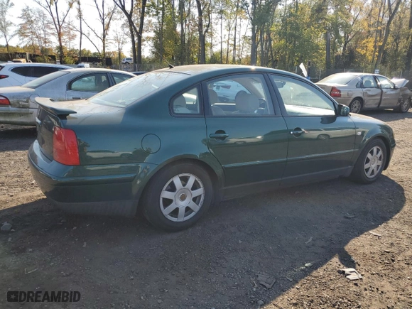 1999 Volkswagen Passat GLS with VIN WVWPD63B5XE497918, listed as a Copart auction lot 75795044 with 121,229 mi miles and Salvage Title. Bid and sale history available at carsss.com. Image 3.