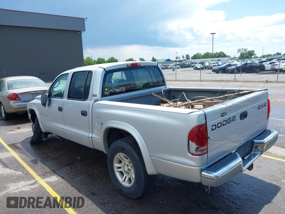 2001 Dodge Dakota with VIN 1B7GG2AX51S167476, listed as a IAAI auction lot 42487594 with 234,228 mi miles and . Bid and sale history available at DreamBid. Image 3.