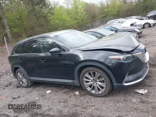 2021 Mazda CX-9 Carbon Edition with VIN JM3TCADY4M0517535, listed as a IAAI auction lot 41821261 with 60,053 mi miles. Bid and sale history available at carsss.com. Image 13.