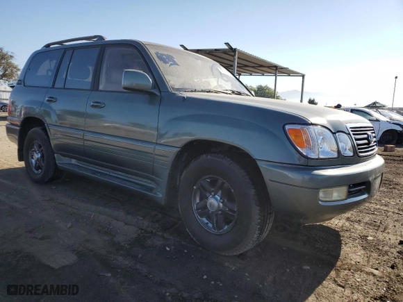 2002 Lexus LX 470 with VIN JTJHT00W723519186, listed as a Copart auction lot 70190464 with 306,793 mi miles and Clean Title. Bid and sale history available at carsss.com. Image 4.