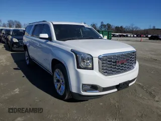 2019 GMC Yukon XL Denali with VIN 1GKS2HKJ2KR103446, listed as a Copart auction lot 88519755 with 77,779 mi miles and Salvage Title. Bid and sale history available at DreamBid. Image 4.