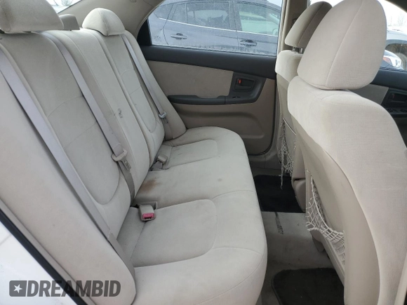 2006 Kia Spectra EX with VIN KNAFE121265208526, listed as a Copart auction lot 80300604 with 101,780 mi miles and Salvage Title. Bid and sale history available at carsss.com. Image 10.