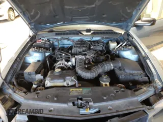 2005 Ford Mustang Deluxe with VIN 1ZVFT84N955258739, listed as a Copart auction lot 53480975 with 154,945 mi miles and Salvage Title. Bid and sale history available at carsss.com. Image 12.