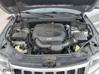 2014 Jeep Grand Cherokee Laredo with VIN 1C4RJEAG8EC393569, listed as a Copart auction lot 49244895 with 151,998 mi miles and Salvage Title. Bid and sale history available at carsss.com. Image 12.