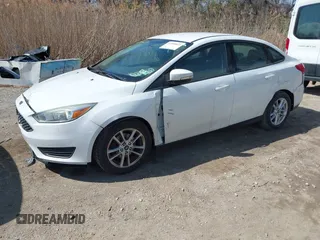 2016 Ford Focus SE with VIN 1FADP3F2XGL354565, listed as a IAAI auction lot 41590623 with 120,047 mi miles. Bid and sale history available at carsss.com. Image 2.