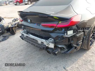 2020 BMW M8 with VIN WBSGV0C06LCD99264, listed as a IAAI auction lot 40276722 with 38,039 mi miles. Bid and sale history available at carsss.com. Image 20.