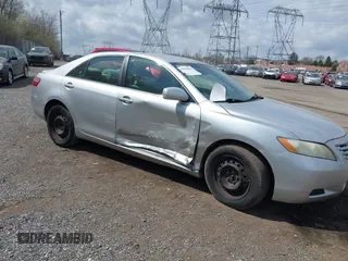 2009 Toyota Camry with VIN 4T1BE46K39U383900, listed as a IAAI auction lot 41930066 with 124,387 mi miles. Bid and sale history available at carsss.com. Image 1.