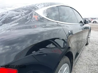 2018 Tesla Model S 75D with VIN 5YJSA1E2XJF248751, listed as a IAAI auction lot 42079081 with 75,904 mi miles and . Bid and sale history available at DreamBid. Image 22.