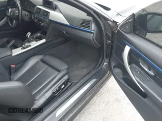 2015 BMW 4 Series 428i with VIN WBA3N3C55FK232319, listed as a IAAI auction lot 42136421 with 140,300 mi miles and . Bid and sale history available at DreamBid. Image 5.
