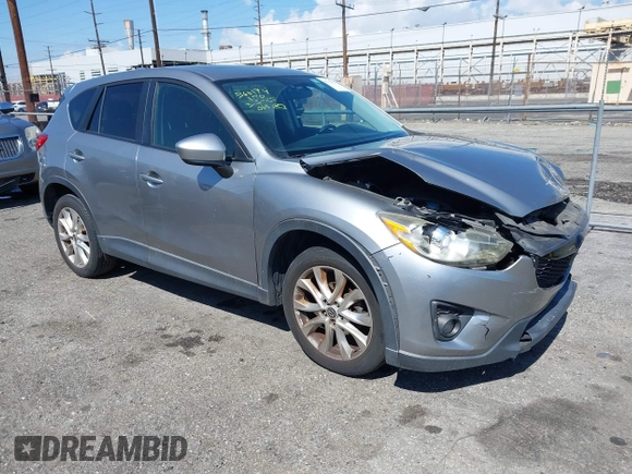 2014 Mazda CX-5 Grand Touring with VIN JM3KE2DY0E0331942, listed as a IAAI auction lot 41750533 with 163,387 mi miles. Bid and sale history available at carsss.com. Image 1.