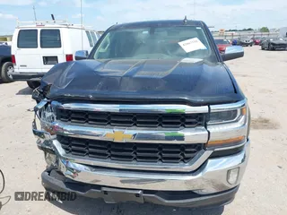 2018 Chevrolet Silverado 1500 LT with VIN 3GCPCREC1JG603937, listed as a IAAI auction lot 42067510 with 81,187 mi miles and . Bid and sale history available at DreamBid. Image 6.