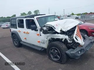 2021 Jeep Wrangler Unlimited Sport S z VIN 1C4HJXDN1MW648061, wystawiony jako IAAI lot #42426882 z przebiegiem 99 008 mil mil oraz . Historia ofert i sprzedaży dostępna na DreamBid. Obrazek 12.