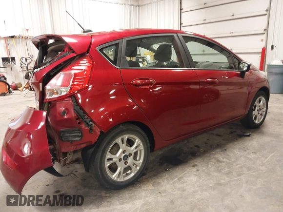 2016 Ford Fiesta SE with VIN 3FADP4EJ4GM114764, listed as a IAAI auction lot 40164385 with 144,336 mi miles. Bid and sale history available at carsss.com. Image 4.