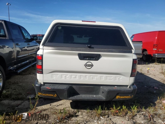 2024 Nissan Frontier S with VIN 1N6ED1CL8RN635597, listed as a Copart auction lot 69277294 with 7,927 mi miles and Salvage Title. Bid and sale history available at carsss.com. Image 6.