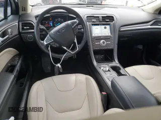2017 Ford Fusion Hybrid Titanium with VIN 3FA6P0RU5HR359714, listed as a Copart auction lot 59156975 with 84,220 mi miles and Salvage title. Bid and sale history available at DreamBid. Image 8.