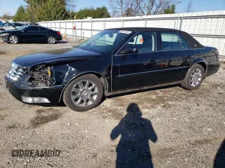 2009 Cadillac DTS 1SC z VIN 1G6KD57Y49U128062, wystawiony jako Copart lot #82623994 z przebiegiem 86 540 mil mil oraz Nie do naprawy • Non repairable. Historia ofert i sprzedaży dostępna na DreamBid. Obrazek 1.