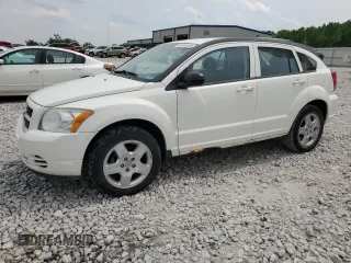 2009 Dodge Caliber SXT z VIN 1B3HB48A89D198108, wystawiony jako Copart lot #58910415 z przebiegiem 176 257 mil mil oraz Czysty tytuł • Clean title. Historia ofert i sprzedaży dostępna na DreamBid. Obrazek 1.