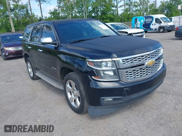 2015 Chevrolet Tahoe LT with VIN 1GNSCBKC1FR615817, listed as a IAAI auction lot 41760474 with 242,148 mi miles and . Bid and sale history available at DreamBid. Image 1.