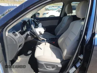 2016 Mazda CX-5 Touring z VIN JM3KE4CY8G0758947, wystawiony jako Copart lot #53140005 z przebiegiem 47 172 mil mil oraz Szkoda całkowita • Salvage title. Historia ofert i sprzedaży dostępna na DreamBid. Obrazek 7.