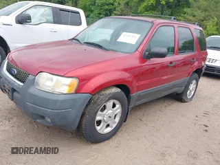 2003 Ford Escape XLT Popular 2 with VIN 1FMYU93153KB78622, listed as a IAAI auction lot 42342301 with Not provided miles and . Bid and sale history available at DreamBid. Image 2.