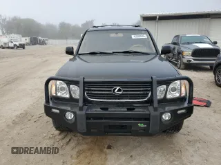2001 Lexus LX 470 z VIN JTJHT00W513509447, wystawiony jako Copart lot #43988595 z przebiegiem 251 861 mil mil oraz Tytuł czysty. Historia ofert i sprzedaży dostępna na DreamBid. Obrazek 5.