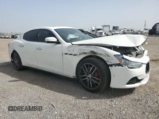 2017 Maserati Ghibli with VIN ZAM57XSA6H1233933, listed as a Copart auction lot 49089525 with 76,965 mi miles and Salvage Title. Bid and sale history available at carsss.com. Image 4.