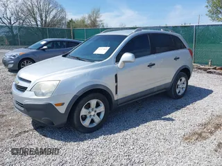 2014 Chevrolet Captiva Sport LS z VIN 3GNAL2EK9ES542755, wystawiony jako IAAI lot #41927805 z przebiegiem 126 551 mil mil oraz . Historia ofert i sprzedaży dostępna na DreamBid. Obrazek 2.