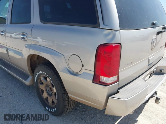 2005 Cadillac Escalade with VIN 1GYEK63NX5R141147, listed as a IAAI auction lot 42518716 with 231,540 mi miles and . Bid and sale history available at DreamBid. Image 6.