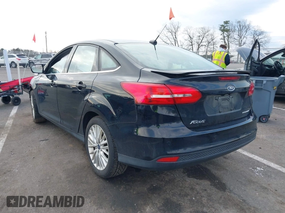 2018 Ford Focus Titanium с VIN 1FADP3J2XJL294107, выставлен на аукционе IAAI как лот 42005814 с пробегом 93 239 миль миль и . История ставок и продаж доступна на DreamBid. Изображение 3.