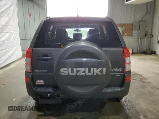 2012 Suzuki Grand Vitara Limited z VIN JS3TD0D76C4100949, wystawiony jako Copart lot #55834305 z przebiegiem 241 042 mil mil oraz Tytuł czysty. Historia ofert i sprzedaży dostępna na DreamBid. Obrazek 6.