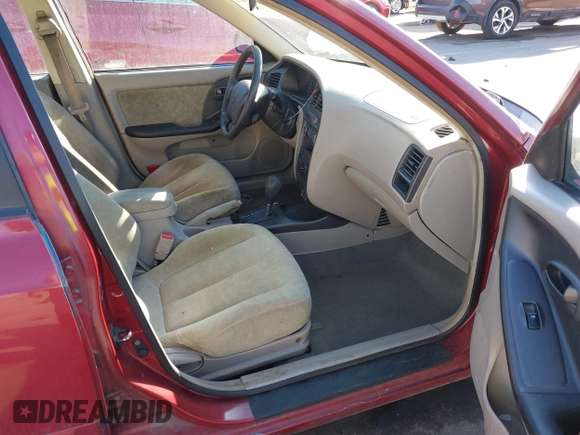 2003 Hyundai Elantra GLS z VIN KMHDN45D93U469313, wystawiony jako IAAI lot #41697422 z przebiegiem 178 571 mil mil oraz . Historia ofert i sprzedaży dostępna na DreamBid. Obrazek 5.