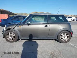 2006 MINI Hardtop with VIN WMWRC33586TJ75043, listed as a IAAI auction lot 41948235 with 138,402 mi miles and . Bid and sale history available at DreamBid. Image 14.