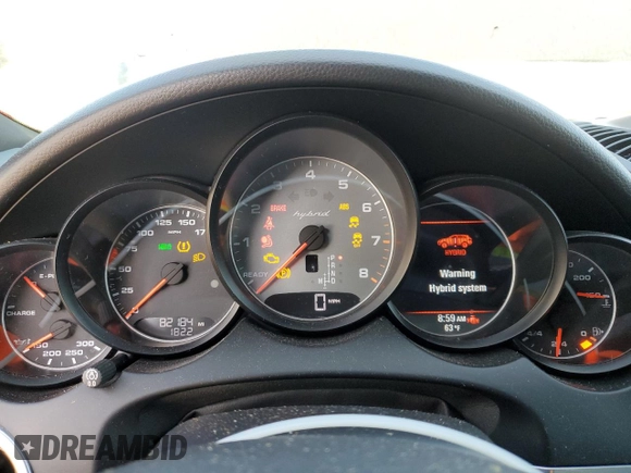 2012 Porsche Cayenne S Hybrid z VIN WP1AE2A21CLA92318, wystawiony jako Copart lot #55595055 z przebiegiem 82 184 mil mil oraz Szkody całkowita. Historia ofert i sprzedaży dostępna na DreamBid. Obrazek 9.