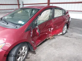 2010 Honda Insight EX with VIN JHMZE2H74AS033674, listed as a IAAI auction lot 41953858 with 144,018 mi miles and . Bid and sale history available at DreamBid. Image 6.
