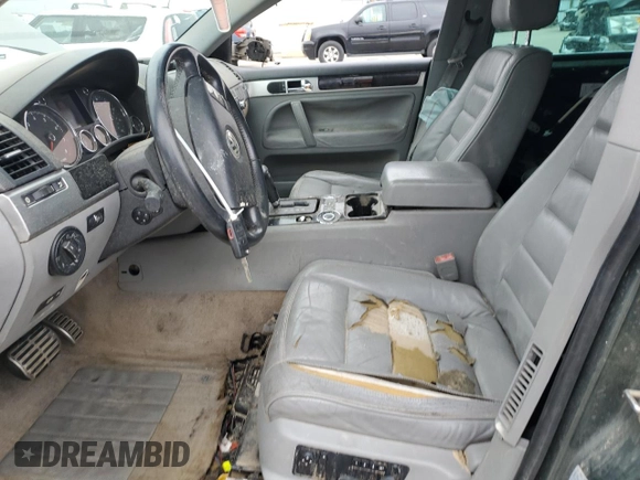 2004 Volkswagen Touareg with VIN WVGCM67L04D027410, listed as a Copart auction lot 79044964 with 100,509 mi miles and Salvage title. Bid and sale history available at DreamBid. Image 7.