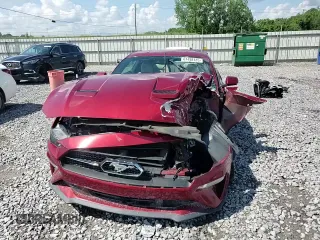 2019 Ford Mustang EcoBoost z VIN 1FA6P8TH9K5166356, wystawiony jako Copart lot #61498185 z przebiegiem 112 999 mil mil oraz Szkoda całkowita • Salvage title. Historia ofert i sprzedaży dostępna na DreamBid. Obrazek 13.