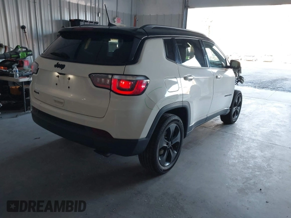 2018 Jeep Compass Altitude with VIN 3C4NJDBB4JT395992, listed as a IAAI auction lot 41318649 with 88,887 mi miles and . Bid and sale history available at carsss.com. Image 4.