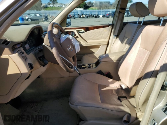 2001 Mercedes-Benz E-Class with VIN WDBJF70J91B263080, listed as a Copart auction lot 88094325 with 193,366 mi miles and Salvage Title. Bid and sale history available at carsss.com. Image 7.