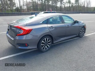 2016 Honda Civic Sedan EX-L with VIN 19XFC1F73GE201419, listed as a IAAI auction lot 42027720 with 168,134 mi miles. Bid and sale history available at carsss.com. Image 4.