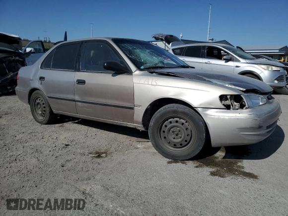 1999 Toyota Corolla VE with VIN 1NXBR12E9XZ158252, listed as a Copart auction lot 58757595 with 232,776 mi miles and Salvage title. Bid and sale history available at DreamBid. Image 4.