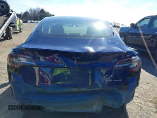 2022 Tesla Model 3 Long Range with VIN 5YJ3E1EB1NF257059, listed as a IAAI auction lot 41329318 with 30,652 mi miles and . Bid and sale history available at DreamBid. Image 16.