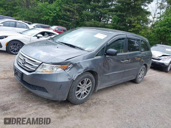 2012 Honda Odyssey EX z VIN 5FNRL5H45CB084342, wystawiony jako IAAI lot #42329303 z przebiegiem 173 711 mil mil oraz . Historia ofert i sprzedaży dostępna na DreamBid. Obrazek 18.