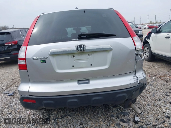 2009 Honda CR-V EX-L with VIN JHLRE487X9C021566, listed as a IAAI auction lot 42008321 with 128,647 mi miles and . Bid and sale history available at carsss.com. Image 16.