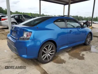 2014 Scion tC z VIN JTKJF5C76E3087992, wystawiony jako Copart lot #56058445 z przebiegiem 84 387 mil mil oraz Czysty tytuł • Clean title. Historia ofert i sprzedaży dostępna na DreamBid. Obrazek 3.