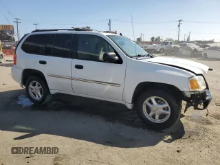 2008 GMC Envoy SLE1 with VIN 1GKDS13S182137239, listed as a Copart auction lot 69627594 with 135,160 mi miles and Salvage Title. Bid and sale history available at DreamBid. Image 4.