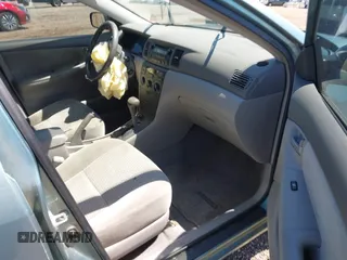 2005 Toyota Corolla CE with VIN 1NXBR32EX5Z373910, listed as a IAAI auction lot 42230582 with 64,004 mi miles and . Bid and sale history available at DreamBid. Image 5.