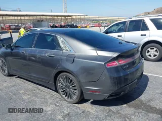 2016 Lincoln MKZ Hybrid with VIN 3LN6L2LU7GR616845, listed as a IAAI auction lot 42651286 with Not provided miles and . Bid and sale history available at DreamBid. Image 6.