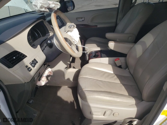 2012 Toyota Sienna XLE AAS with VIN 5TDYK3DC1CS235737, listed as a Copart auction lot 47414415 with 288,446 mi miles and Salvage Title. Bid and sale history available at carsss.com. Image 7.